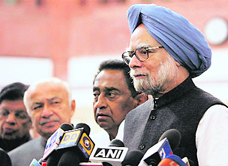 Prime Minister Manmohan Singh with Union Parliamentary Affairs Minister Kamal Nath and Union Home Minister Sushilkumar Shinde after the all-party meeting in New Delhi on Tuesday.