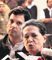 Congress president Sonia Gandhi, along with her son and party vice-president Rahul Gandhi, addresses the media in New Delhi on Sunday.