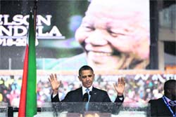 Farewell, madiba: President Barack Obama arrives to deliver a speech during the memorial service for late South African President Nelson Mandela at Soccer City Stadium in Johannesburg on Tuesday