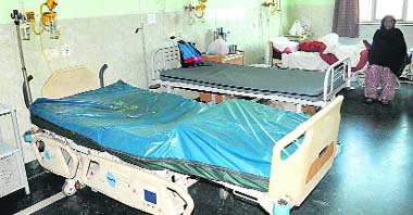 Unoccupied beds at Punjab Institute of Medical Sciences in Jalandhar say it all. Tribune photo Malkiat Singh