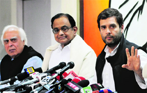 Congress V-P Rahul Gandhi with Union ministers P Chidambaram and Kapil Sibal in New Delhi. 