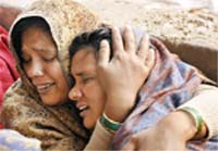 Grieving relatives of Ravinder, who was allegedly murdered. Tribune photo: Ravi Kumar