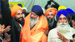 Sikh activist Gurbaksh Singh Khalsa (left) with Lal Singh at Mohali on Friday.