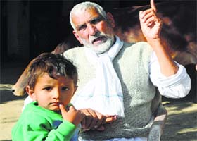 Fugana villages ex-sarpanch Ved Pal Malik stood against his men to defend Muslim neighbours