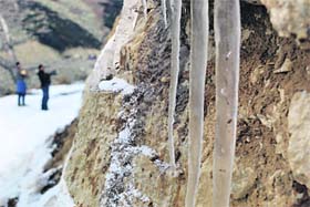 Chill factor A tourist captures the view as icicles appear at Sinthan Top, 48 km from Kokernag, in Anantnag district of south Kashmir on Sunday