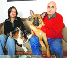 Four for company: Neepa and Alok Sharma with their pets