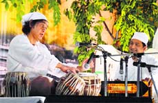 Ustad Zakir Hussain performing at Bhaini Sahib. Photo: Inderjeet Verma