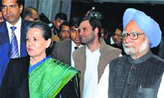 AICC chief Sonia Gandhi, PM Manmohan Singh and party vice-president Rahul Gandhi arrive for the Congress Working Committee meeting in New Delhi on Thursday. Tribune photo: Mukesh Aggarwal