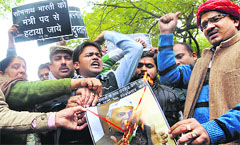 Hindu Sena actvists raise slogans against Somnath Bharti. 