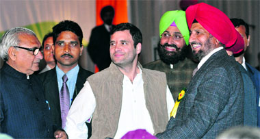 Congress vice-president Rahul Gandhi (C) with Haryana CM Bhupinder Singh Hooda (left), PPCC chief Partap SIngh Bajwa (green turban) and an ex-servicemen at an interactive meet in Chandigarh on Monday.