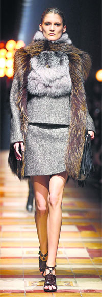 A model presents a creation by Israeli-American designer Alber Elbaz as part of his Fall/Winter 2014-2015 women's ready-to-wear collection show for fashion house Lanvin during Paris Fashion Week February 27.