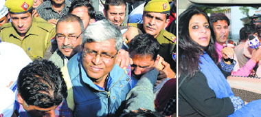 (Left) AAP leader Ashutosh being taken for questioning; party leader Shazia Ilmi after being quizzed by the Delhi Police on Thursday.