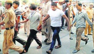 The four convicts being brought to a Delhi court.