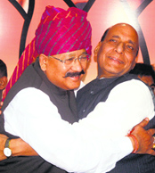 Satpal Maharaj being welcomed by BJP president Rajnath Singh into the party fold in New Delhi on Friday.