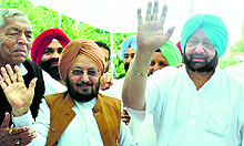 Congress leaders Lal Singh and Capt Amarinder Singh during a public meeting in Patiala on Tuesday
