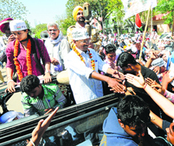 AAP convener Arvind Kejriwal at a road show in Chandigarh on Sunday.
