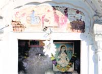 A damaged fresco near the entrance to the Golden Temple