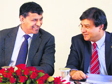 RBI Governor Raghuram Rajan and his deputy Urjit Patel at the RBI headquarters in Mumbai on Tuesday.
