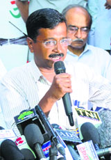 AAP chief Arvind Kejriwal talks to the media in New Delhi. 