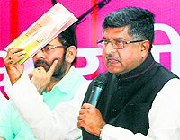 BJP leaders Ravi Shankar Prasad (R) and Mukhtar Abbas Naqvi at a press conference in New Delhi on Friday