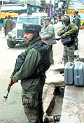 Securitymen at the scene of a militant attack in south Kashmirs Anantnag district on Tuesday