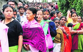 Impressive turnout in phase 2: Women queue up at a polling station in Itanagar on Wednesday