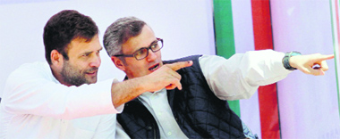 Congress vice-president Rahul Gandhi and J-K Chief Minister Omar Abdullah during a rally in Doda on Friday