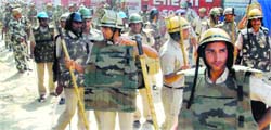 Paramilitary personnel on duty at Punhana village in Mewat on Saturday.