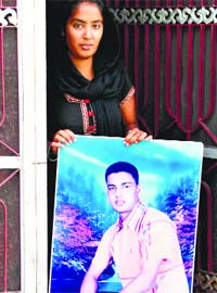 Sister of Amritpal Singh, a Jalandhar  youth detained in Texas, show his picture
