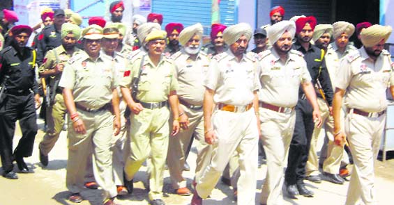 Police personnel met residents and sought their cooperation in Jagraon. A Tribune photograph