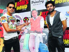 Gippy Grewal and (R) Rohit Jugraj