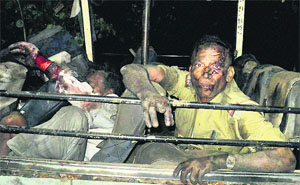 Injured police and polling officials after an attack by Maoists in Dumka district of Jharkhand on Thursday.