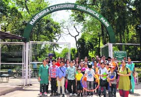 Children accompanied by their parents during a picnic at Chhat Bir Zoo
