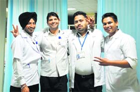 Male nurses strike a pose in Ludhiana on Monday