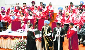 PAU Vice-Chancellor Baldev Singh Dhillon awards a degree to a student at the annual convocation in Ludhiana