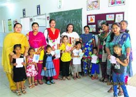 Students with their mothers at BBSB Convent School, Sidhwan Bet