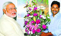 YSR Congress Party chief Jagan Mohan Reddy greets Narendra Modi in New Delhi on Monday. PTI 