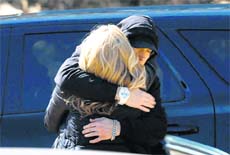 Eminem hugs his mother