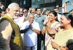 PM-elect Narendra Modi gets a warm send-off from new Gujarat CM Anandiben Patel and other party leaders in Ahmedabad on Thursday
