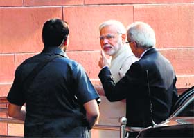 Prime Minister Narendra Modi arrives for the first Cabinet meeting of his government in New Delhi on Tuesday