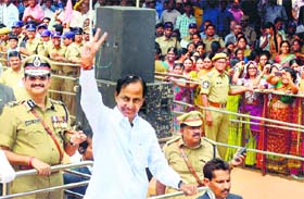 THE BEGINNING: Telangana first Chief Minister K Chandrashekar Rao waves to the crowd at the state's Formation Day celebrations in Secunderabad on Monday