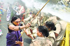 Water cannons being used to disperse BJP Mahila Morcha workers during a protest in Lucknow on Monday
