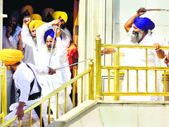 Members of the SGPC task force and SAD (Amritsar) activists clash at Akal Takht in Amritsar on Friday.