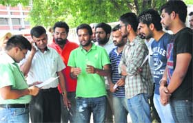 NSUI representatives discuss a point before submitting a memorandum to the Vice-Chancellor at Panjab University on Tuesday