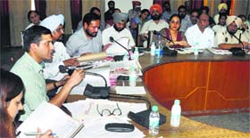 Deputy Commissioner Rajat Aggarwal (second from left) addresses officers on Wednesday