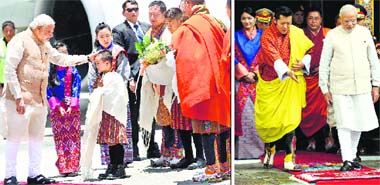 THIMPHU ROLLS OUT RED CARPET: Prime Minister Narendra Modi is welcomed on his arrival at Paro International Airport in Bhutan; and (right) Modi with Bhutan King Jigme Khesar Namgyel Wangchuck at a ceremonial reception at Royal Palace in Thimphu on Sunday