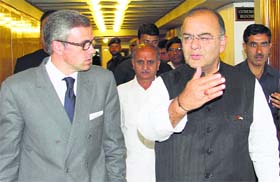 Defence Minister Arun Jaitley with Jammu and Kashmir Chief Minister Omar Abdullah in Srinagar on Sunday