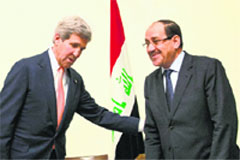 Iraqi Prime Minister Nuri al-Maliki (R) and US Secretary of State John Kerry meet at the Prime Minister's Office in Baghdad on Monday. AFP 