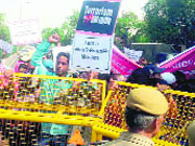 Muslims take out a march condemning the killing of Shias and damaging their shrines in Iraq, at Nizamuddin in New Delhi on Friday.