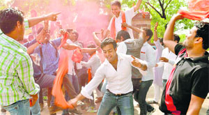 Students celebrate after the Delhi University scrapped the FYUP programme on Friday.
